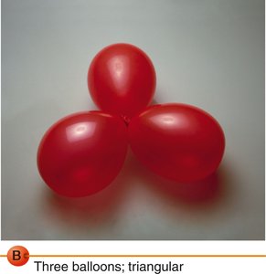Three balloons representing trigonal planar geometry