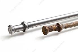 Iron nails, one corroded and one shiny
