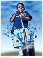 Child drinking soda through a straw, illustrating atmospheric pressure pushing liquid up the straw
