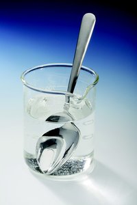 Sugar can be dissolved in the water to produce a solution.
