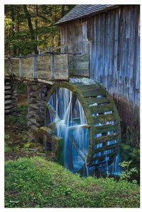 Waterwheel converting kinetic energy of water to mechanical energy