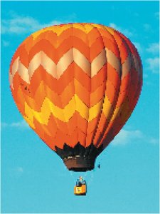 Hot air balloon rising due to Charles's law