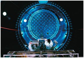 Technicians inspecting reactor core