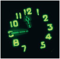 Radium watch dial glowing in the dark