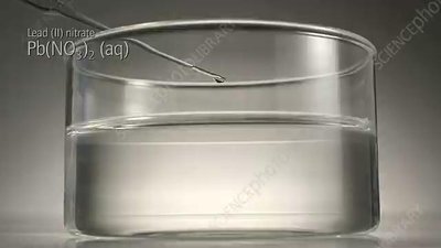 Mixing solutions to form a precipitate in double displacement