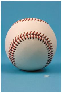Baseball and rice grain comparison for proton and electron mass