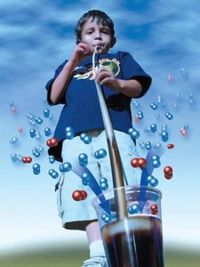 Child drinking through a straw, illustrating gas pressure