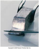 Metal sample being cut