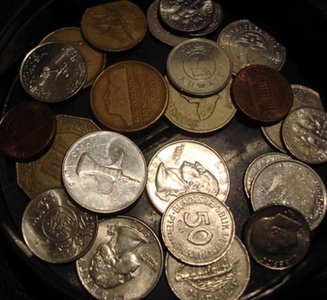 Coins representing conservation of mass