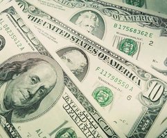 U.S. dollar bills representing fiat money