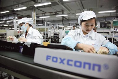 Workers at Foxconn, illustrating global production networks