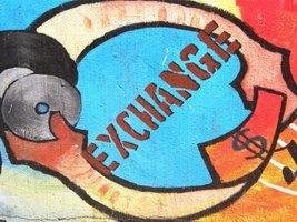 Exchange symbol, representing the medium of exchange function of money