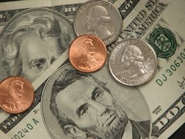U.S. coins and bills, representing modern currency