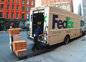 FedEx truck representing investment and business spending