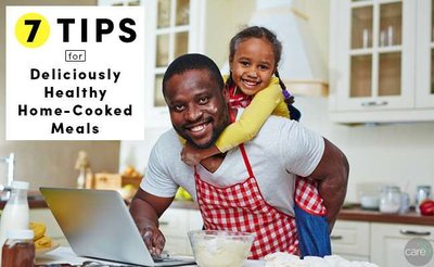Father and child cooking at home
