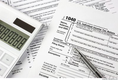 Photo of U.S. income tax forms and calculator