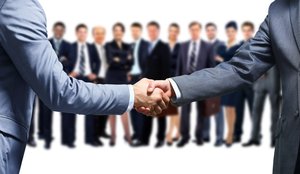 Business partners shaking hands