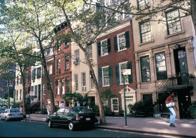 Row of apartments, representing rent control