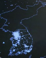Satellite image showing economic development contrast between North and South Korea