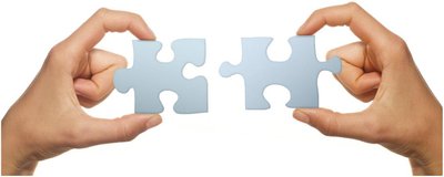 Two hands holding puzzle pieces to illustrate how medical words are constructed from parts