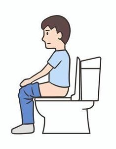 Person sitting on toilet