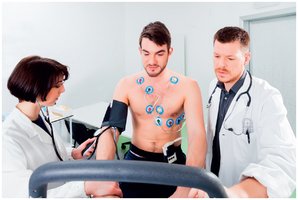 Man undergoing stress test on treadmill