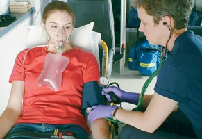 Reassessment after epinephrine administration, monitoring ABCs and vital signs