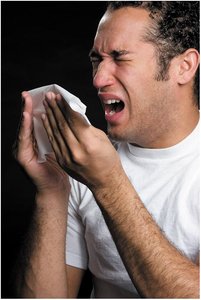 Person sneezing, spreading infection