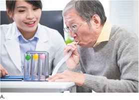 Patient using incentive spirometer