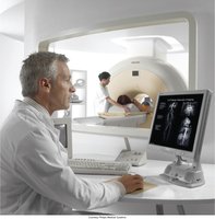 MRI procedure with patient and technologist