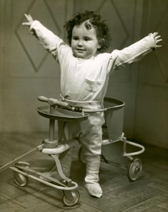 Child in leg braces, historical polio reference