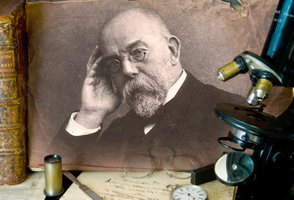 Robert Koch with microscope