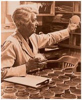 Scientist working with petri dishes