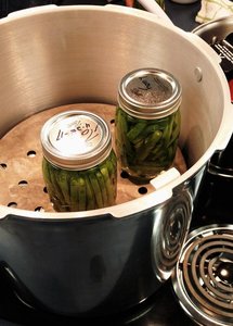 Pressure canning jars in a canner