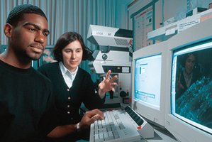 Agricultural microbiologist sampling soil