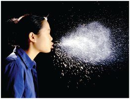Image of droplet transmission via sneezing