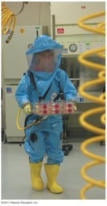 BSL-4 worker handling Ebola virus cultures