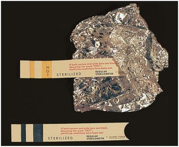 Sterilization indicator strips showing sterilized and non-sterilized conditions