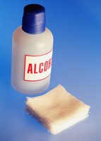 Alcohol bottle and gauze