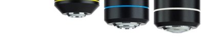 Objective lenses with color bands