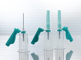 Needle safety device