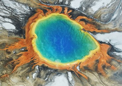 Hot spring with colorful microbial mats, representing extreme environments for archaea