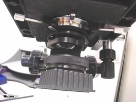 Microscope iris diaphragm lever and stage adjustment knob