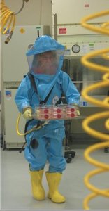Scientist in BSL-4 suit