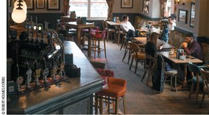 Near-empty restaurant illustrating sunk cost decision