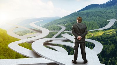 A person facing multiple paths, symbolizing decision-making and optimization