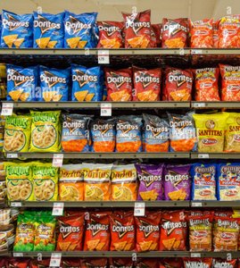 Shelves of ultra-processed snack foods