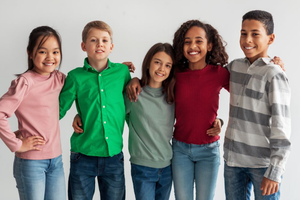 Group of preteens smiling together