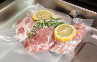 Meat marinated with lemon slices as an example of acid-induced denaturation