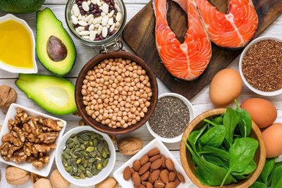 Variety of healthy fat sources: fish, avocado, nuts, seeds, eggs, leafy greens